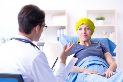 cancer patient visiting doctor for medical consultation in clinic